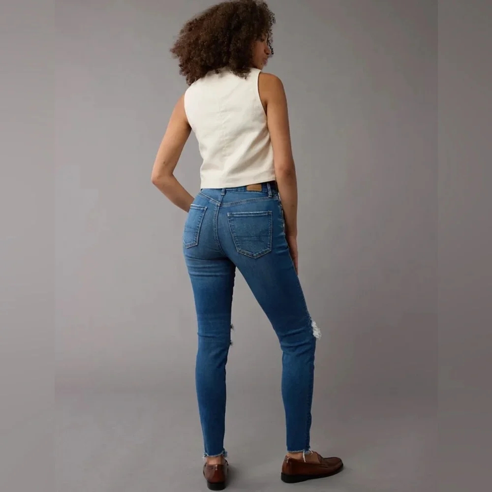 American‎ Eagle High Rise Jegging. Distressed. Women size 12